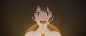 Movie still from “Belle” (2021), directed by Mamoru Hosoda – An animated picture of a girl with a surprised look on her face; Close Up shot, Low angle