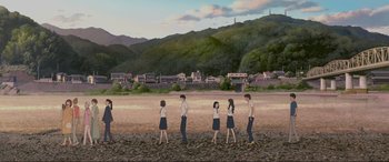 Movie still from “Belle” (2021), directed by Mamoru Hosoda – A group of people standing on top of a sandy beach; Extreme Wide shot, High angle