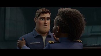 A man and a woman are looking at one another