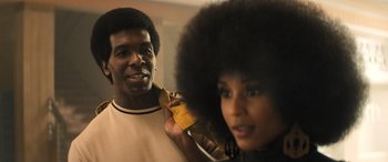 Movie still from “Big George Foreman” (2023), directed by George Tillman Jr. – A man and a woman are looking at each other; Close Up shot, Over the shoulder angle