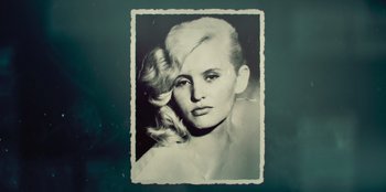 An old photo of a woman with blonde hair