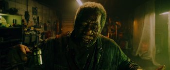 An old man with green hair and a green shirt