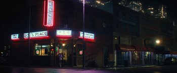 Movie still from “Birds of Prey” (2020), directed by Cathy Yan – Two people walking down the sidewalk at night; Extreme Wide shot, Low angle