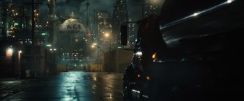 Movie still from “Birds of Prey” (2020), directed by Cathy Yan – A truck driving down a street at night; Extreme Wide shot, High angle