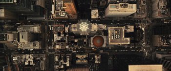 Movie still from “Birds of Prey” (2020), directed by Cathy Yan – An aerial view of a city with many buildings; Extreme Wide shot, Overhead angle