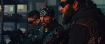 Movie still from “Birds of Prey” (2020), directed by Cathy Yan – A group of men in leather jackets and bandannas; Close Up shot, Over the shoulder angle