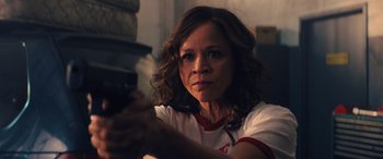 Movie still from “Birds of Prey” (2020), directed by Cathy Yan – A person holding a camera; Close Up shot, Low angle