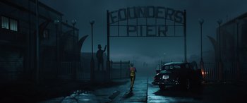 Movie still from “Birds of Prey” (2020), directed by Cathy Yan – A man in a yellow suit walking down a street; Extreme Wide shot, High angle