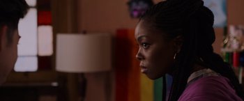 Movie still from “Black as Night” (2021), directed by Maritte Lee Go – A person looking at the camera; Close Up shot, Over the shoulder angle