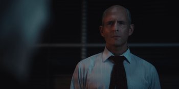 Movie still from “BlackBerry” (2023), directed by Matt Johnson – A man in a white shirt and a red neck tie; Close Up shot, Low angle