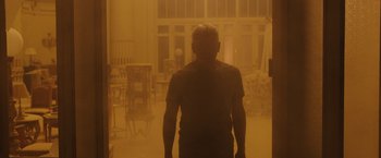 Movie still from “Blade Runner 2049” (2017), directed by Denis Villeneuve – A man standing in an empty room in the fog; Medium shot, Low angle