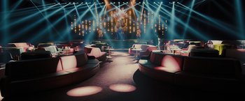 Movie still from “Blade Runner 2049” (2017), directed by Denis Villeneuve – A stage lit up with lights in a room; Extreme Wide shot, High angle