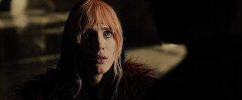Movie still from “Blade Runner 2049” (2017), directed by Denis Villeneuve – A person wearing a fur coat; Close Up shot, Over the shoulder angle