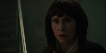 Movie still from “Blood Red Sky” (2021), directed by Peter Thorwarth – A person wearing a white shirt; Close Up shot, Over the shoulder angle