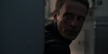 Movie still from “Blood Red Sky” (2021), directed by Peter Thorwarth – A person looking at the camera; Close Up shot, Low angle