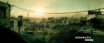 Movie still from “Bloodshot” (2020), directed by Dave Wilson – A view of a city from a window of a building; Extreme Wide shot, Low angle