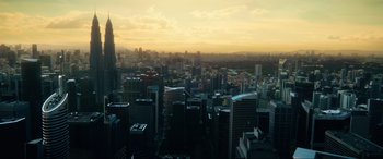 Movie still from “Bloodshot” (2020), directed by Dave Wilson – A view of a city skyline at sunset; Extreme Wide shot, High angle