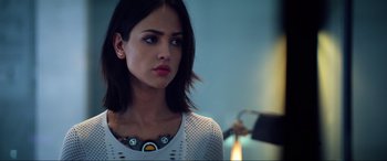 Movie still from “Bloodshot” (2020), directed by Dave Wilson – A beautiful young lady wearing a white sweater; Close Up shot, Over the shoulder angle