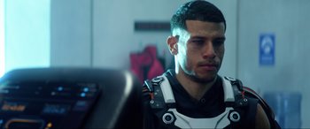 Movie still from “Bloodshot” (2020), directed by Dave Wilson – A person with a helmet on; Close Up shot, Over the shoulder angle