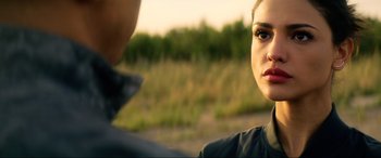 Movie still from “Bloodshot” (2020), directed by Dave Wilson – A woman's face as a man looks on; Close Up shot, Over the shoulder angle