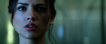 Movie still from “Bloodshot” (2020), directed by Dave Wilson – A woman's face with dark makeup; Close Up shot, Low angle