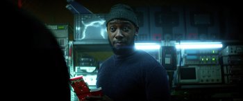 Movie still from “Bloodshot” (2020), directed by Dave Wilson – A man holding a box in his hands; Close Up shot, Low angle