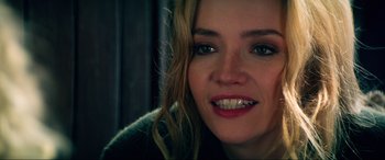 Movie still from “Bloodshot” (2020), directed by Dave Wilson – A woman's face with long blonde hair; Close Up shot, Over the shoulder angle