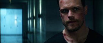 Movie still from “Bloodshot” (2020), directed by Dave Wilson – A person with blood all over his face; Close Up shot, Low angle