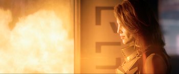 Movie still from “Bloodshot” (2020), directed by Dave Wilson – A woman is standing in front of a window; Close Up shot, Low angle