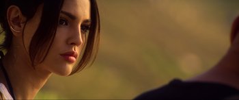 Movie still from “Bloodshot” (2020), directed by Dave Wilson – A woman's face with a blurry background; Close Up shot, Over the shoulder angle