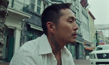 A person wearing a white shirt