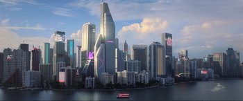 Movie still from “Blue Beetle” (2023), directed by Angel Manuel Soto – A boat is in front of a city skyline; Extreme Wide shot, Low angle