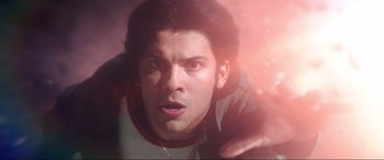 Movie still from “Blue Beetle” (2023), directed by Angel Manuel Soto – A person with his mouth wide open; Close Up shot, Low angle