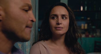 Movie still from “Blue Miracle” (2021), directed by Julio Quintana – A woman and a man looking at each other; Close Up shot, Over the shoulder angle