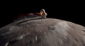 Movie still from “Blush” (2021), directed by Joe Mateo – An image of an astronaut on the surface of the moon; Extreme Wide shot, High angle