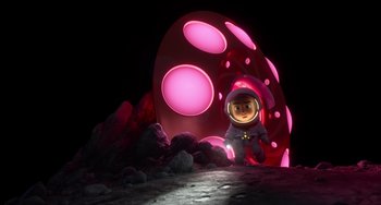 Movie still from “Blush” (2021), directed by Joe Mateo – An animated figure in a space suit next to an illuminated mushroom; Wide shot, Overhead angle