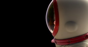 Movie still from “Blush” (2021), directed by Joe Mateo – View of a person wearing a space suit; Extreme Close Up shot, Low angle