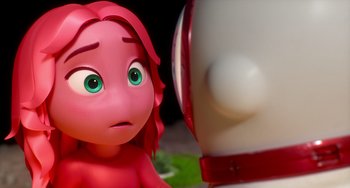 Movie still from “Blush” (2021), directed by Joe Mateo – A pink doll is looking at a white doll; Close Up shot, Over the shoulder angle
