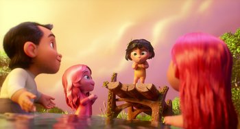 Movie still from “Blush” (2021), directed by Joe Mateo – A couple of people that are standing in the grass; Wide shot, Over the shoulder angle