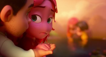 Movie still from “Blush” (2021), directed by Joe Mateo – A person holding a toy; Close Up shot, Over the shoulder angle