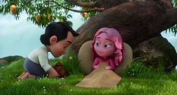 Movie still from “Blush” (2021), directed by Joe Mateo – A boy and a girl are sitting in the grass; Medium shot, Over the shoulder angle