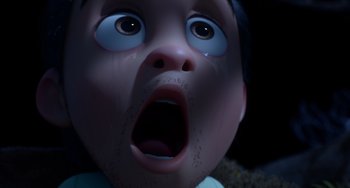 Movie still from “Blush” (2021), directed by Joe Mateo – The face of a doll with its mouth open; Extreme Close Up shot, High angle