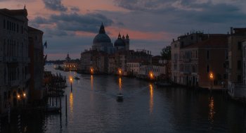 Movie still from “Book Club: The Next Chapter” (2023), directed by Bill Holderman – A view of a city at night from across a river; Extreme Wide shot, High angle