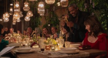 Movie still from “Book Club: The Next Chapter” (2023), directed by Bill Holderman – A group of people sitting at a dinner table; Wide shot, High angle