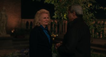Movie still from “Book Club: The Next Chapter” (2023), directed by Bill Holderman – A man and a woman talking to each other outside; Medium shot, Over the shoulder angle