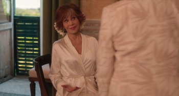 Movie still from “Book Club: The Next Chapter” (2023), directed by Bill Holderman – A woman in a white robe looking at another woman in a white robe; Medium shot, Over the shoulder angle