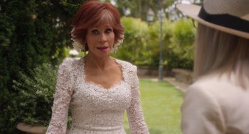 Movie still from “Book Club: The Next Chapter” (2023), directed by Bill Holderman – A person wearing a wedding dress; Close Up shot, Over the shoulder angle