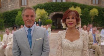 Movie still from “Book Club: The Next Chapter” (2023), directed by Bill Holderman – An older man standing next to an older woman; Close Up shot, Over the shoulder angle