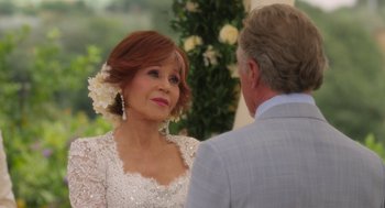 Movie still from “Book Club: The Next Chapter” (2023), directed by Bill Holderman – An older woman in a white dress and a man in a white suit; Close Up shot, Over the shoulder angle