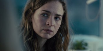 Movie still from “Books of Blood” (2020), directed by Brannon Braga – A person with long brown hair; Close Up shot, Over the shoulder angle